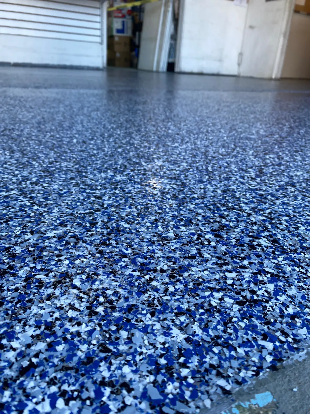 Blue and black flake epoxy garage floor
